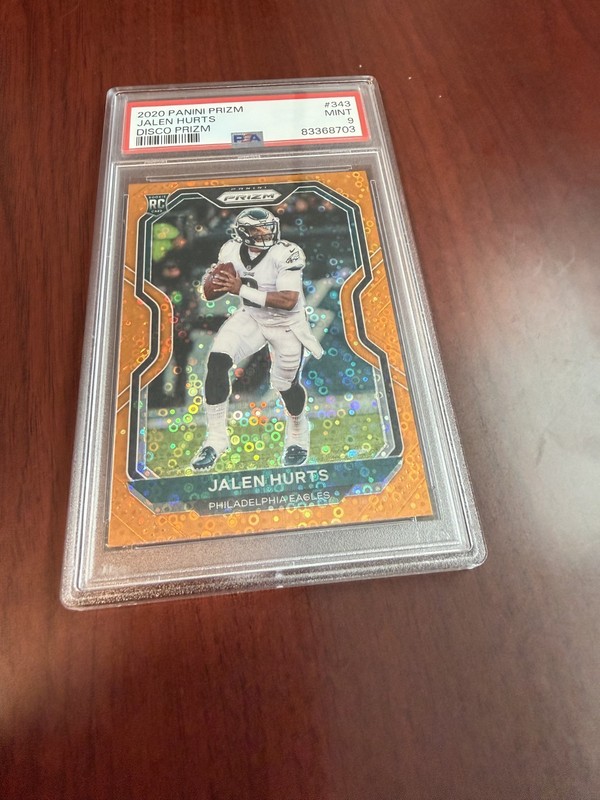 2020 Panini Prizm #343 Jalen Hurts Orange Disco Prizm Rookie Card. PSA 9