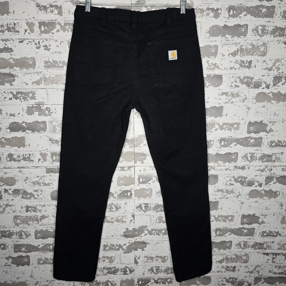 Pantalones de mezclilla Carhartt para hombre 33x32 negros resistentes flexibles calce ajustado pantalón de pato pierna cónica Foto 4 de 4
