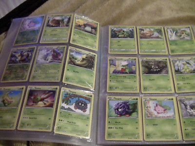 huge folder full of pokemon cards no doubles 100 holo and rare 400+ cards