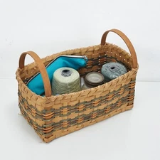 Woven Basket with Handles and Assorted Craft Supplies Yarn Buttons Needles