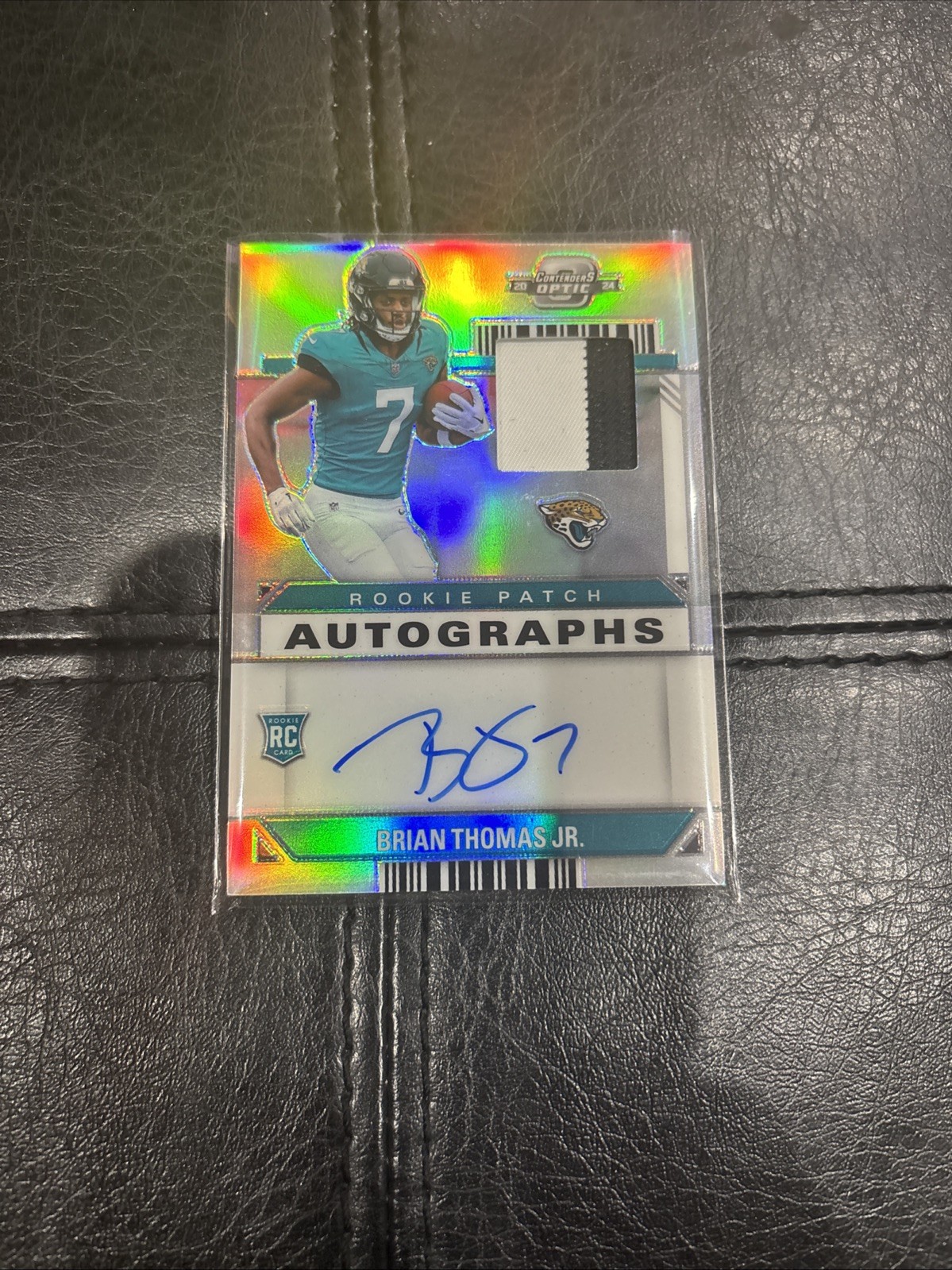 Brian Thomas Jr. 2024 Panini Contenders Optic Silver Jersey Auto RPA /75