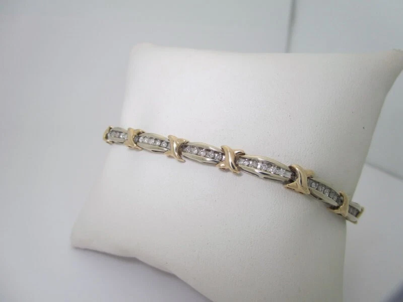 Bonita pulsera de tenis moissanita corte redondo de 2 quilates 7" en chapada en oro bicolor de 14 quilates Foto 3 de 4