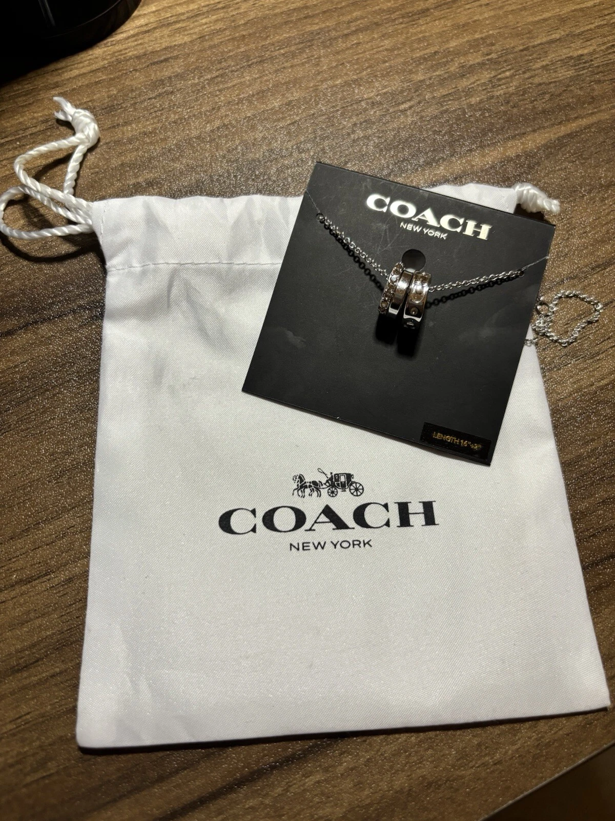 Collana Rondell firmata Coach in argento con sacchetto antipolvere