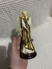 Angel Playing a Long Horn Enesco Figurine 1994 gold - music not functional