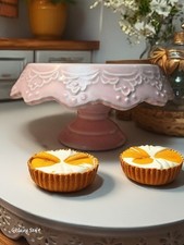 Pink ceramic mini cake riser