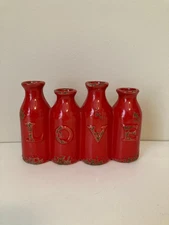 Red Ceramic Decorative Vase As Conjoined 4 Milk Bottles That Spell Love