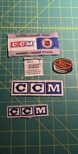 Assorted CCM Hockey Club NHL Patch Puck