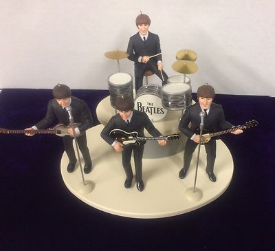 BEATLES ED SULLIVAN FIGURE SET OF 4 WITH INSTRUMENTS ON BEATLES ED SULLIVAN FIGURE SET OF 4 WITH INSTRUMENTS ON