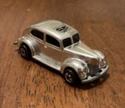 Vintage Hot Wheels Chrome 1940 Ford 2-Door 25th Anniversary 1:64 Scale Diecast.