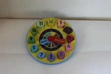 EUC Melissa  Doug Wooden multicolor shape sorting clock toy