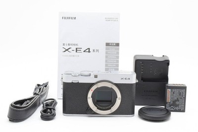 8680 shots Excellent condition Fujifilm X E4 Silver Battery Charger Set