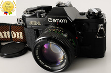Appareil photo reflex argentique Canon AE-1 noir + New FD 50mm F1.4【N.MINT w/...