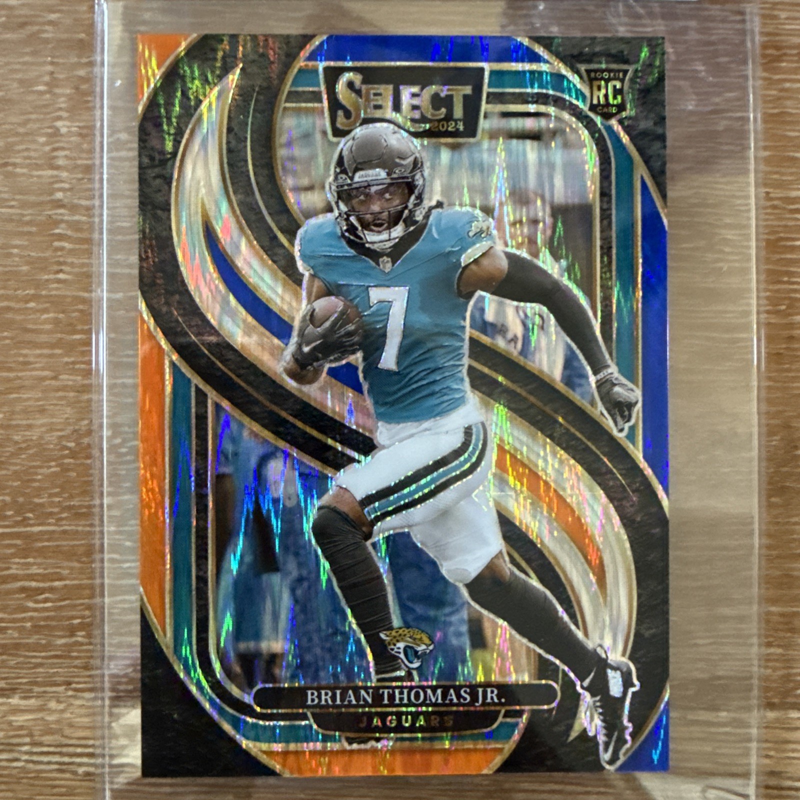 2024 Select - Brian Thomas Jr. #143 Orange & Blue Shock Prizm (RC) Rookie SP /35