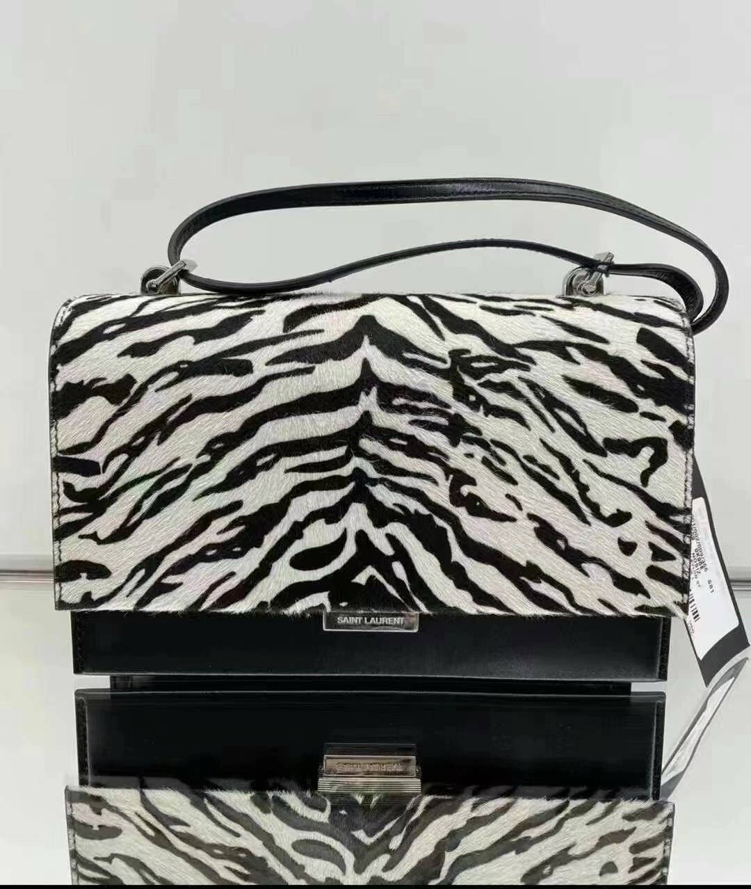 Nuova borsa a tracolla Yves Saint Laurent pelle di vitello pony capelli nero bianco