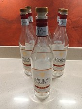 7 leere Pineau Charentes Rose Flaschen