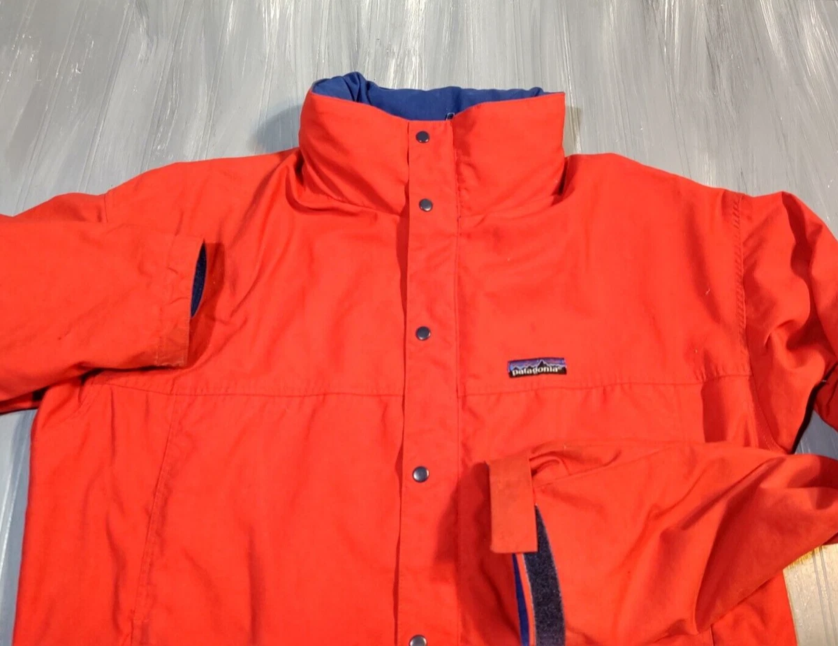 Patagonia red top blue jacket
