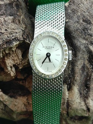 vintage Minimax 17 Jewels Shockproof Swiss Made ladies' watch with a mesh band.