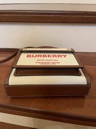 Buberry Mini Canvas and Leather Pocket Bag/$1,350 + Tax - Picture 10 of 12