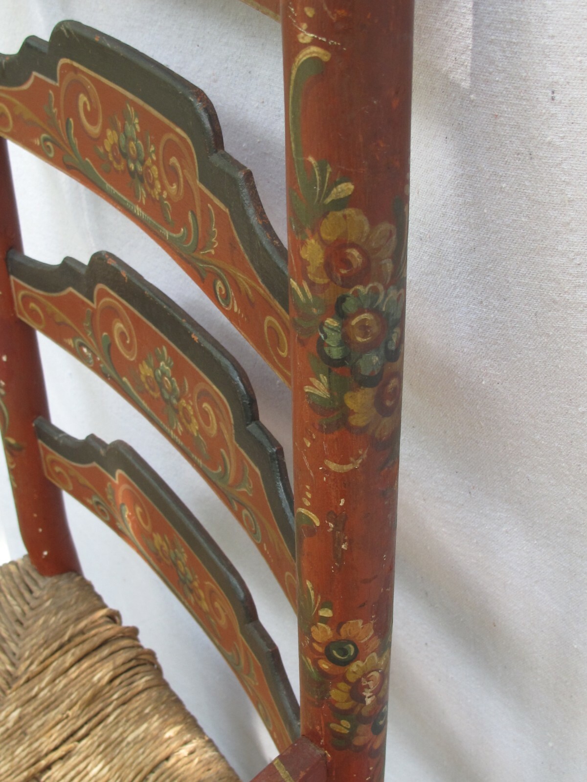 Hand-painted decoration on double doors in traditional with rush-seated  ladder-back chair and terracotta tiled floor Stock Photo - Alamy