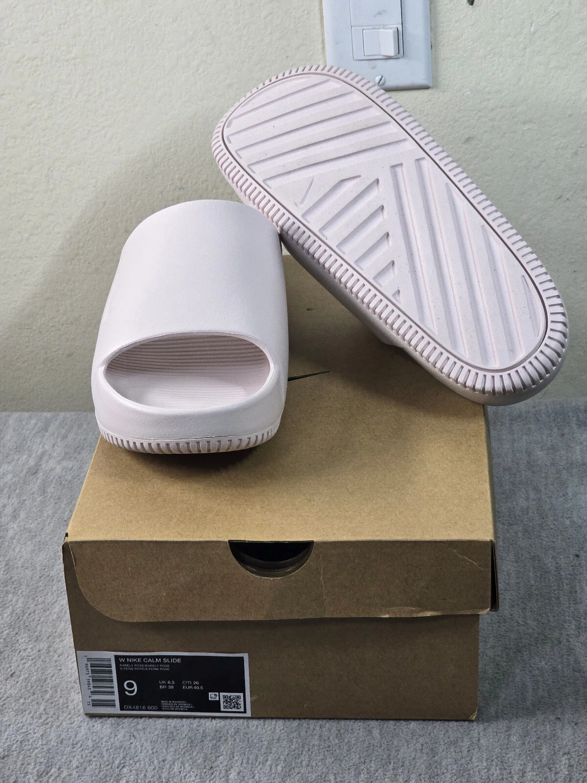 W Nike Calm Slide DX4816 600 di colore appena rosa (taglia 9)