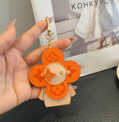 Louis Vuitton Orange Leather Sunflower Charm Keychain Accessory
