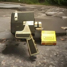 Running Bell & Howell Autoload Movie Camera, a roll kodachrome flim