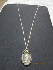 Gold Tone Pendant Necklace With Large Gemstone In a Tulip Design.
