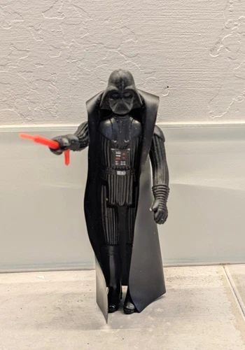 Original Kenner 1977 Darth Vader action figure with complete  light saber