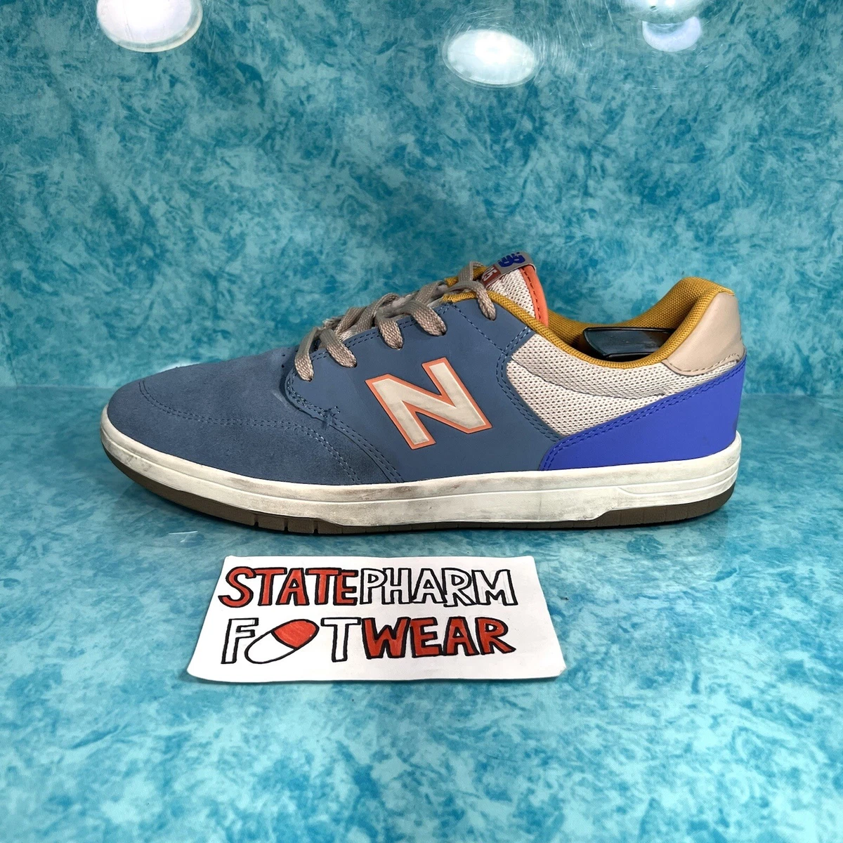 New balance top bleu et jaune