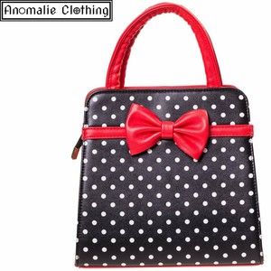 black and white polka dot bag