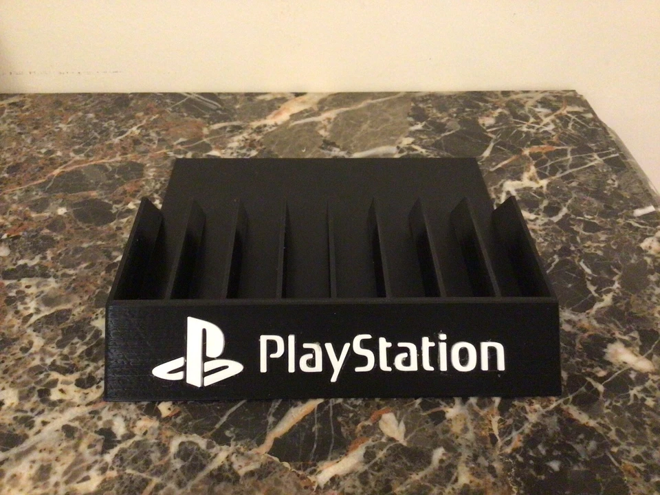 SONY PLAYSTATION 1 GAME STAND SUPPORTO 8 GIOCHI STAMPA 3D NUOVO PORTA GIOCHI - Immagine 3 di 4