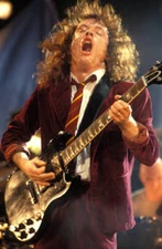 Ac Dc And Ac/Dc And Angus Young Playing Gibson Sg Guitar 1990s Old Music Photo