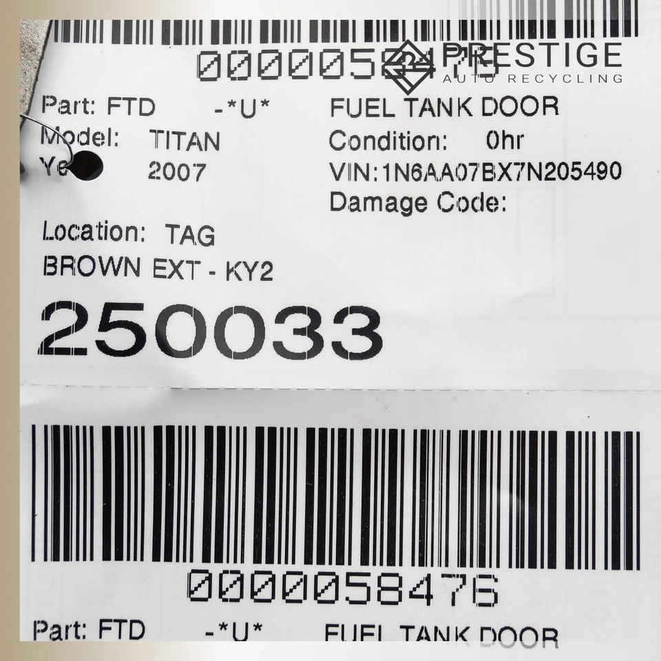 Cubierta de pestillo de tapa de puerta de llenado de combustible Nissan Titan 2004-2011 marrón 93870-7S231 OEM Foto 3 de 3