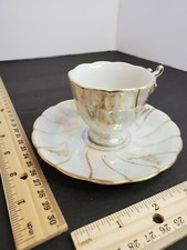 Shafford Luster iridescent Gold Pedestal Teacup And Saucer unique handle pretty
