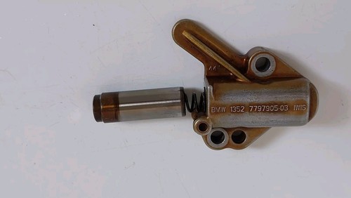 Timing belt chain tensioner