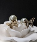 Dior Pearl Butterfly Tribal Earrings in Gold tone