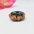 Artisan Lampwork Glass Bead Black Orange Pink Swirl Designer Bead. — photo 1