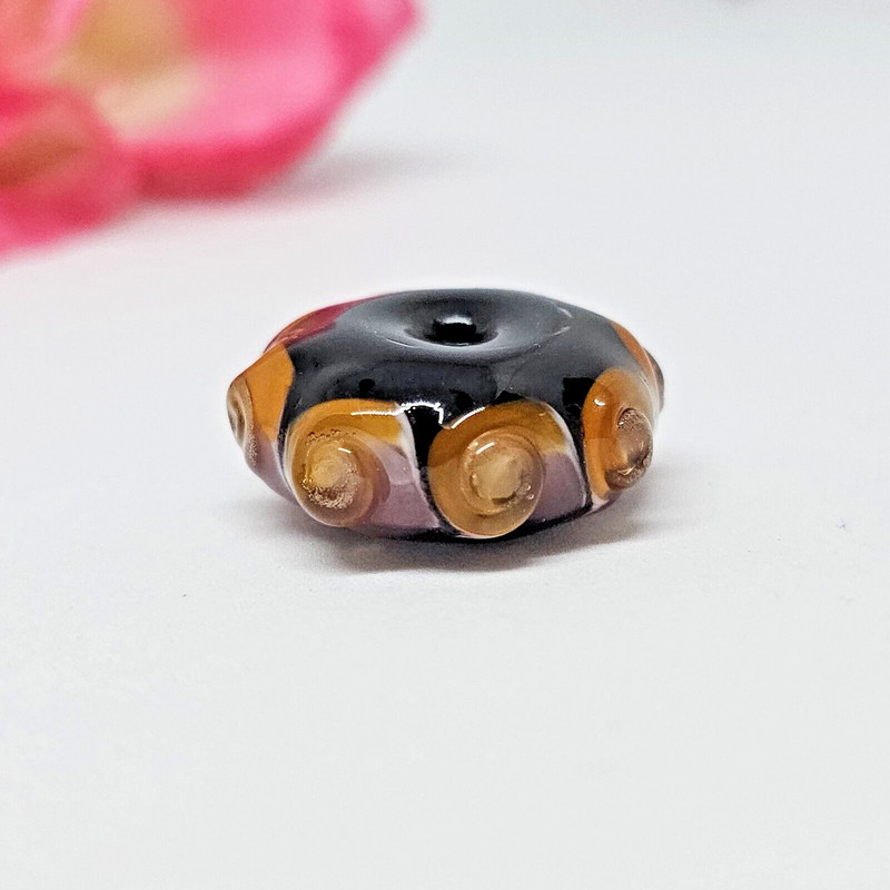 Artisan Lampwork Glass Bead Black Orange Pink Swirl Designer Bead.