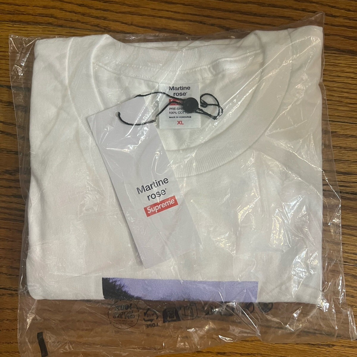In-hand Supreme Martine Rose Lee Scratch Perry Tee White