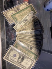 Lot of World Currency Notes - 27 US banknotes, foreign Circulated.