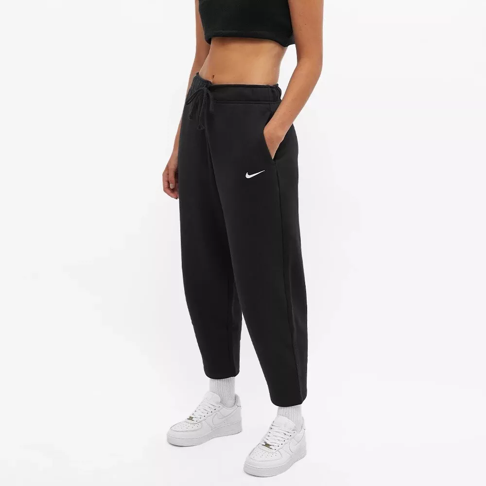 Nike mini swoosh high rise woven trousers in black | ASOS