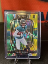 2025 Panini Select Travis Hunter Green and Yellow Shock Prizm Premier Level #128