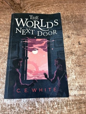 The Worlds Next Door: A mysterious old - Paperback, by White C. E. - Good