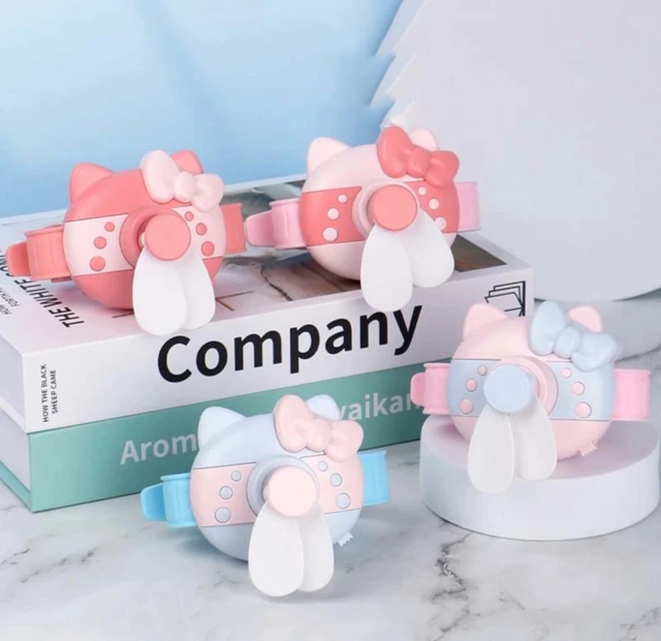 Mini ventilador de reloj pequeño silencioso portátil recargable USB HelloKitty Foto 2 de 4