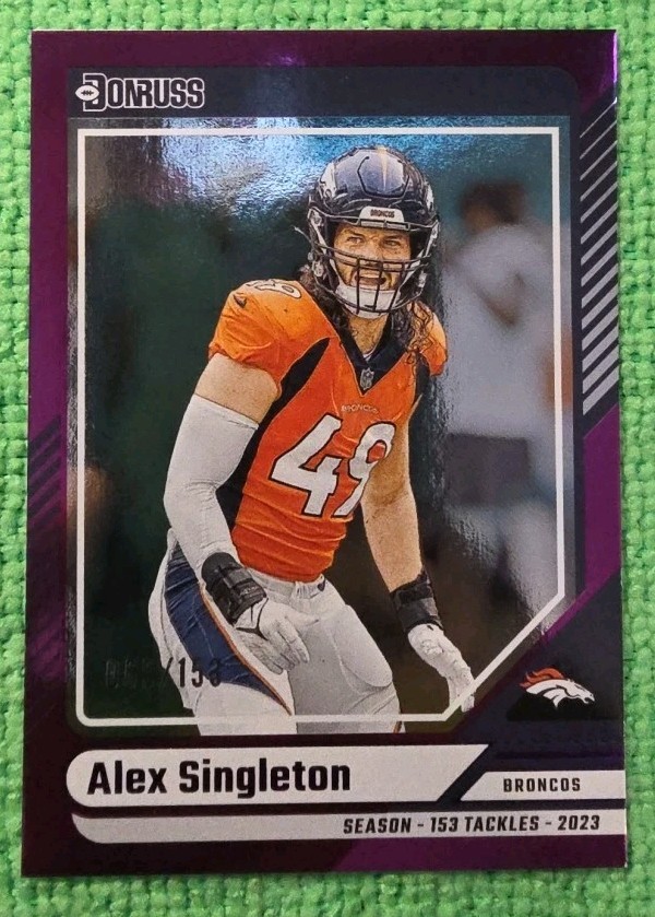 2024 Panini Donruss #231 Alex Singleton Tackles Purple Foil /153 Denver Broncos