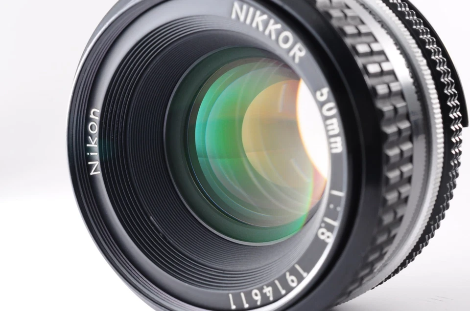 **LENTE COMO NUEVO** Cámara fotográfica Nikon FE 35mm SLR plateada + Ai 50mm f/1.8 + tapa de JPN Foto 3 de 4