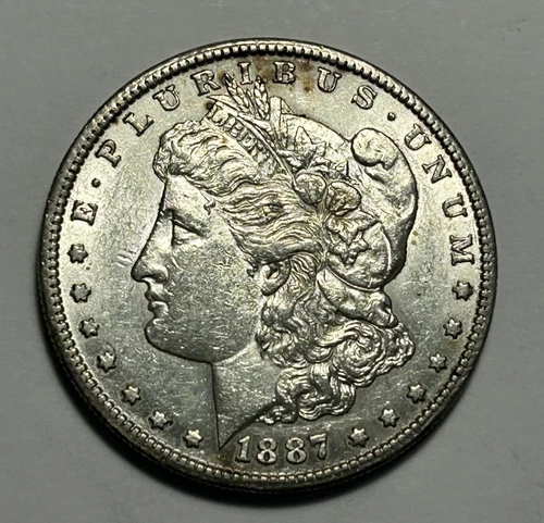 1887 S  MORGAN DOLLAR AU