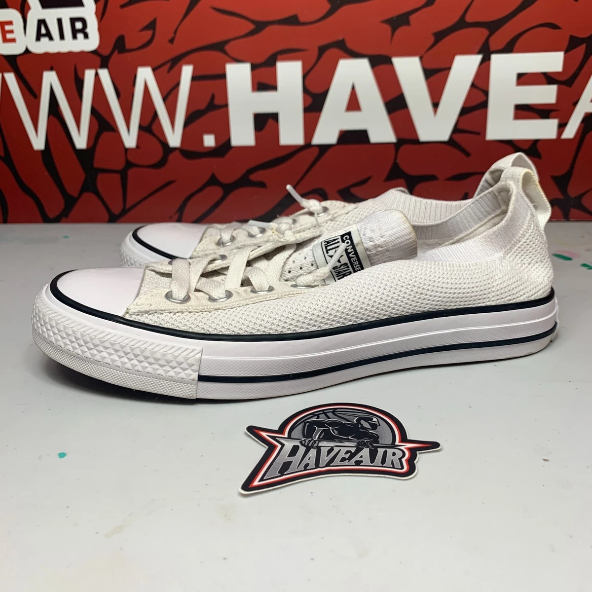 All white best sale slip on converse
