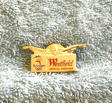 #D659. SYDNEY 2000 OLYMPIC BADGE - WESTFIELD OFFICIAL PARTNER, SWIMMING