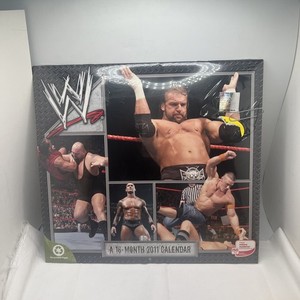 2011 WWE 16-Month Calendar Rey Mysterio Triple H The Undertaker Batista  Sealed